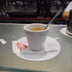 Hollett-Bazouzi, Linda Title: Espresso at McDonald's, the Train Station in La Spezia, Italy