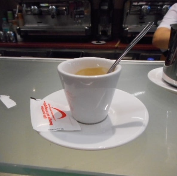 Hollett-Bazouzi, Linda Title: Espresso at McDonald's, the Train Station in La Spezia, Italy