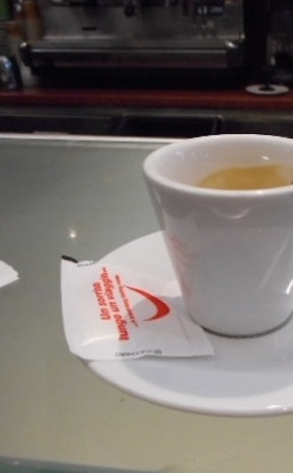 Hollett-Bazouzi, Linda Title: Espresso at McDonald's, the Train Station in La Spezia, Italy