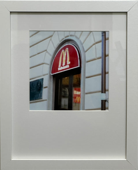 Hollett-Bazouzi, Linda Title: McDonald's at the Train Station, La Speza, Italy