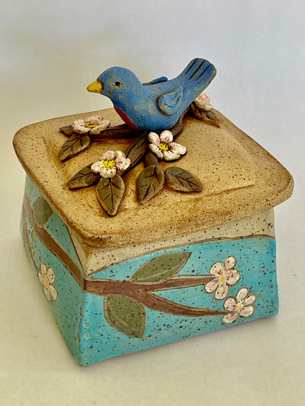 Joyce Leatherwood title: Bluebird Box with Pink Tree Blossoms